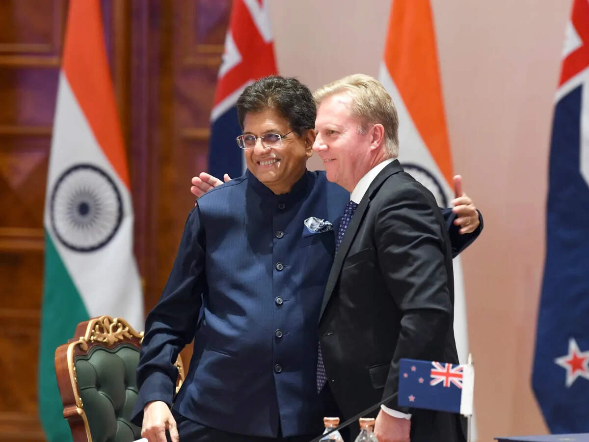 <p>Union Minister of Commerce and Industry Piyush Goyal and New Zealand's Trade and Investment Minister Todd McClay embrace each other as they sign the India-New Zealand Free Trade Agreement, in New Delhi on Monday.</p>