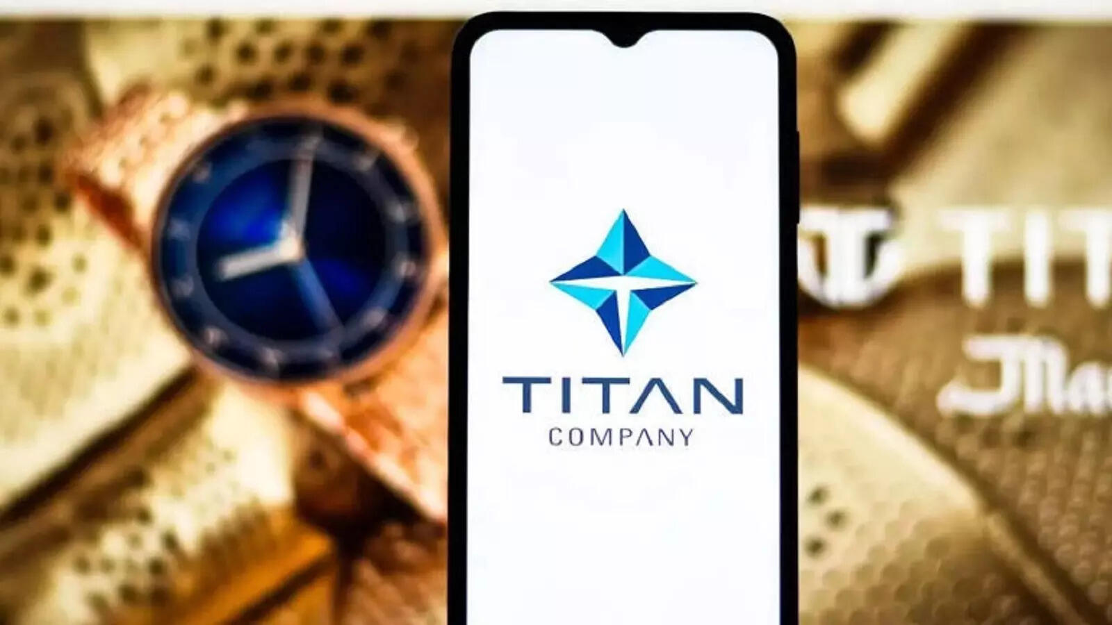 titan company share price hike 4% today