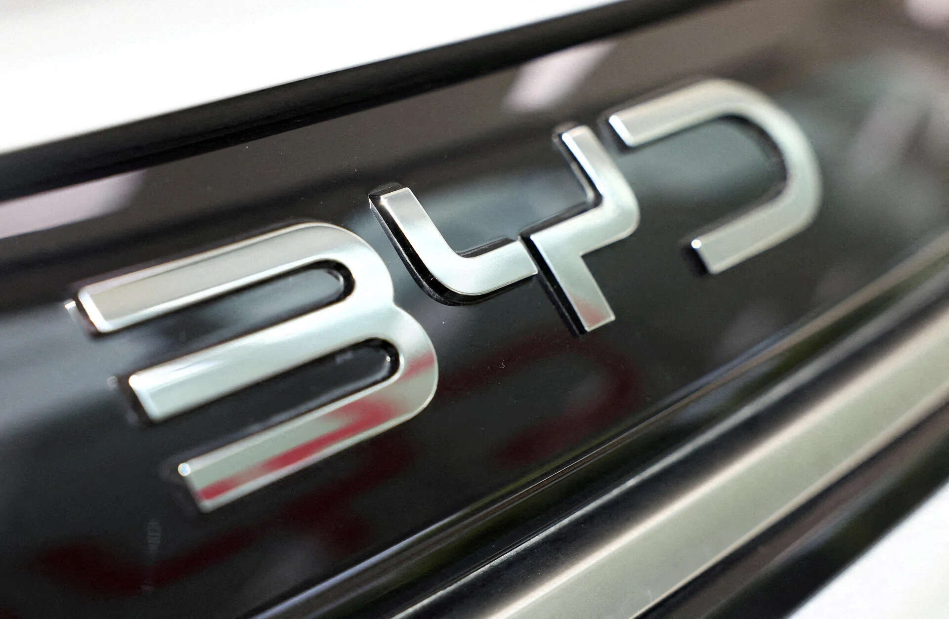 <p>This move aims to enhance its global presence and showcase its capabilities.</p><p>“><figcaption><span>This move aims to enhance its global presence and showcase its capabilities.</span></figcaption></figure><p>Electric vehicle giant BYD is interested in getting involved with the Formula One motor racing circuit as it aims to boost its brand outside its home market of China, where it already has a strong foothold.</p><p> However, becoming F1’s first Chinese outfit would be expensive and linking up with an existing team poses challenges, so a sponsorship-based approach might provide an easier pathway into the sport.</p><p> “Everyone wants to be involved with F1,” said Ian Moore, a research analyst from Bernstein. “It’s because it’s the greatest marketing vehicle for OEMs (Original Equipment Manufacturers) that’s out there”.</p><p> Liberty Media-owned F1 already contains European and U.S. auto manufacturers like Ferrari, Mercedes-Benz, Ford Motor and General Motors’ Cadillac, ‌who develop race engines ⁠or car ⁠bodies for teams.</p><h3>Full F1 entry costs hundreds of millions of dollars <br /></h3><p> International Automobile Federation (FIA) President Mohammed Ben Sulayem and F1 are open to the idea of having a Chinese team, providing it brings commercial and sporting benefits for all.</p><p> BYD declined to comment on its goals in F1.</p><p> If it does decide to enter, there is space for one more team on the grid and BYD would have a strong commercial case to be F1’s 12th competitor: it is the world’s largest EV maker by sales, China has its Shanghai Grand Prix and there are 221.1 million F1 fans in China, according to Formula One. By 2028, it aims to produce locally all the cars it sells in Europe.</p><p> However, if BYD decides to go down this path, it must clear ⁠several hurdles.</p><p> “From a ‌financial point of view it might not sound like a wise move to spend so much money on a field they barely know,” Felipe Munoz, an independent analyst who runs the Car Industry Analysis platform, told Reuters.</p><p> Spending on infrastructure and a wind tunnel ⁠would be costly with no guarantee of success; for example, Aston Martin F1 team’s factory and campus in Silverstone, which includes a wind tunnel, is estimated to have cost between £150 million and £200 million, and the team have so far scored one point this season.</p><p> A new team would likely need to pay more than $450 million in anti-dilution fees as Cadillac did to enter this year, since more teams impact income distribution.</p><p> Other options also pose challenges.</p><p> Buying into a team could be one way, with Alpine F1 team’s minority stakeholder Otro Capital looking to sell its 24 per cent stake, but majority owners Renault are unwilling to cede control and must approve any deal.</p><p> Former Red Bull boss Christian Horner is looking to get back into the sport and has had some contact with BYD, but the Otro stake might suit his ‌purposes better.</p><h3>Sponsorship option could cause conflict</h3><p> There could be opportunities, instead, for a branding-led approach.</p><p> “Entering F1 as a sponsor only would be the lowest risk for BYD because it avoids the FIA regulatory requirements such as demonstrating technical and governance compliance requirements,” Nick De Marco, a sports law barrister for Blackstone Chambers, told Reuters.</p><p> BYD ⁠could potentially sponsor a midfield or back-of-the-pack team at a lower cost than a top-tier team like Oracle Red Bull Racing, where Oracle is paying $300 million over five years for title branding.</p><p> For instance, software company Atlassian has a title partnership with nine-time constructors’ champion Williams worth between $40 million to $60 million a year.</p><p> Bernstein analysts estimated that the automotive category accounts for only 1 per cent in annual F1 sponsorship value, while technology accounts for 14 per cent and luxury accounts for 26 per cent.</p><p> Formula One has no series-level auto partner like LVMH’s $100 million a year deal, where its multiple luxury brands feature across the sport.</p><p> “I’m not sure if that’s an option (for BYD) given that they’re also an OEM,” Moore said, noting that a BYD sponsorship could possibly put it in conflict with existing auto manufacturers in F1.</p><p> De Marco, however, pointed out that a sponsorship approach would mean BYD not demonstrating its engineering and manufacturing abilities.</p><p> “I imagine (that) is the key benefit BYD would seek to derive from that participation”.</p><div><ul><li><a href=