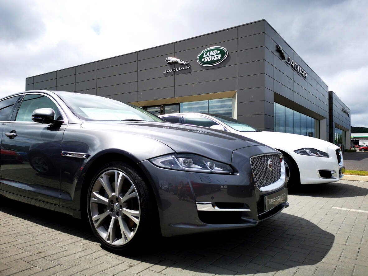 

<p>Volumes were hit by a supplier fire, Middle East disruptions, and the phase-out of older Jaguar models.</p>
<p>“/><figcaption class=