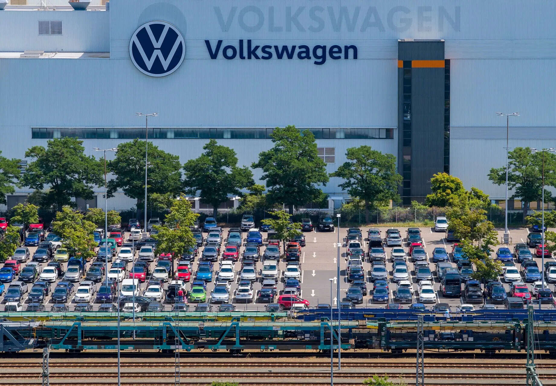 

<p>VW, whose brands range from mass-market SEATs to premium Porsches, had previously announced plans to axe up to 50,000 jobs in Germany, including 35,000 at its namesake marque.</p>
<p>“/><figcaption class=
