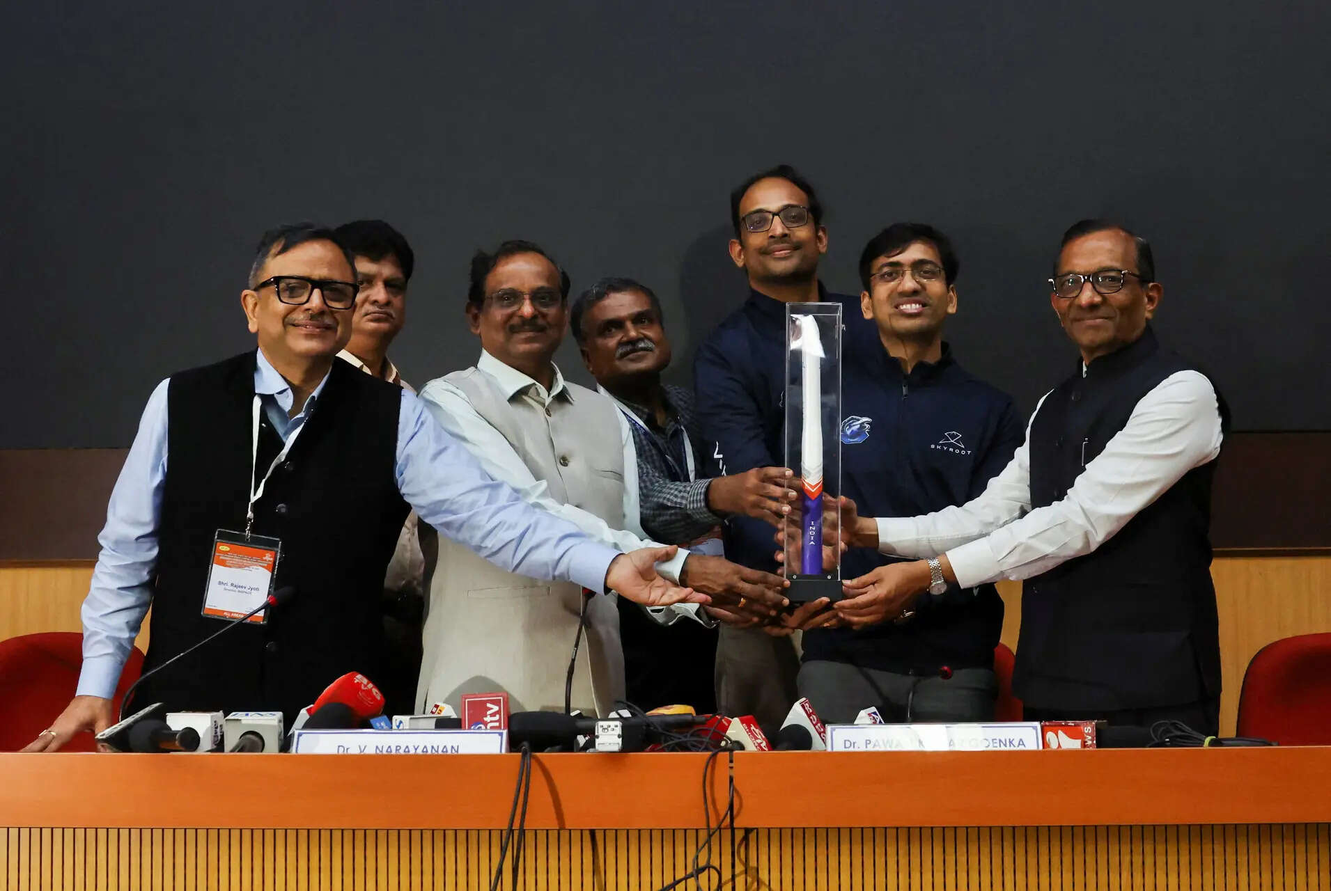 <p>V. Narayanan, Chairman of ISRO, Pawan Goenka, Chairman of IN-SPACe, Pawan Kumar Chandana, Co-founder and CEO of Skyroot Aerospace, and Naga Bharath Daka, Co-founder and COO of Skyroot Aerospace, pose with a model of the Vikram-1 rocket.</p>