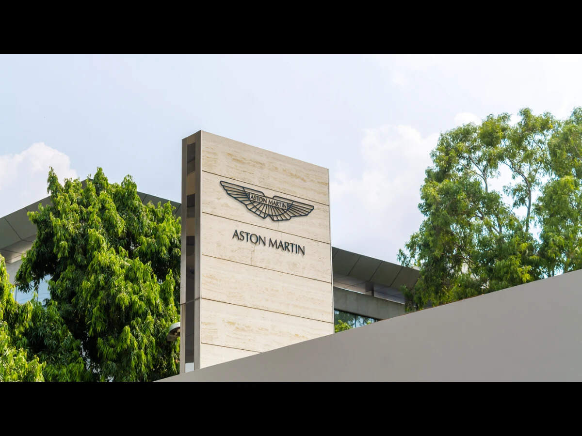 Aston Martins net debt rose 12 percent to £1.54 billion in the second quarter, while financing costs surged.