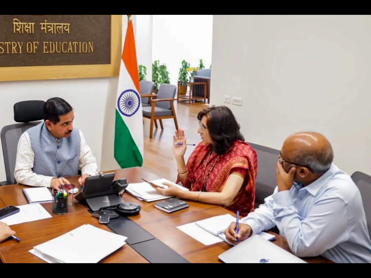 Union Education Minister Pralhad Joshi, left, reviews structural reforms at the National Testing Agency (NTA).