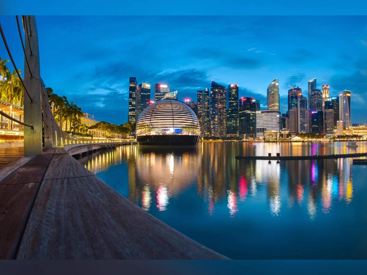 Cityscape Skyline Evening Lights Reflection, Apple Marina Bay Sands, Singapore.