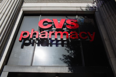 CVS Health Corp. signage is displayed outside a pharmacy store in downtown Los Angeles, California, U.S., on Friday, Oct. 27, 2017. Photographer: Christopher Lee/Bloomberg