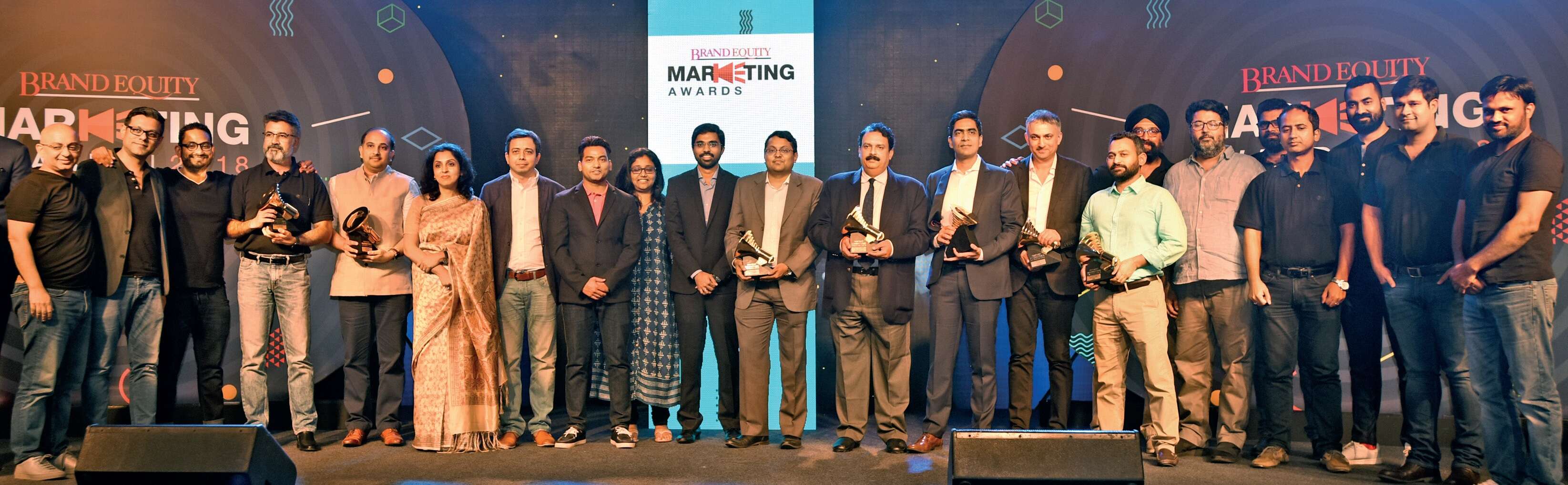 A CUT ABOVE THE REST: The teams and senior leaders representing the winning brands - Bajaj V, Sonata ACT (Titan), MakeMyTrip, Asian Paints, Rajasthan Tourism, Saregama and Durex.