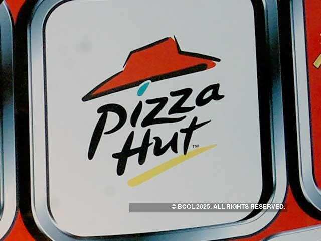 Yum misses estimates on key sales measure as Pizza Hut, KFC fizzle