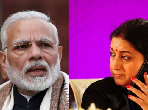 PM Narendra Modi and I&B minister Smriti Irani (R).