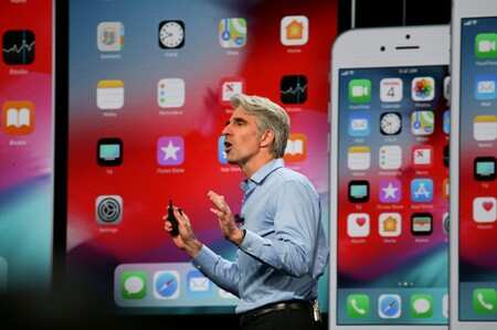Apple senior vice president of Software Engineering Craig Federighi speaks at the Apple Worldwide Developer Conference (WWDC) in San Jose, California, U.S., June 4, 2018. REUTERS/Elijah Nouvelage