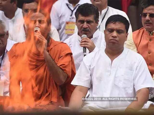 A billionaire and a yogi team up on a mobile app. No, this is not a joke