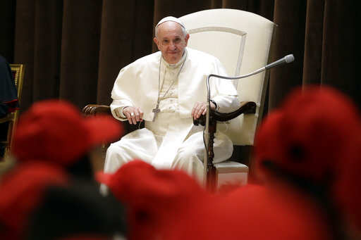 Pope Francis tells top oil executives world must convert to clean fuel