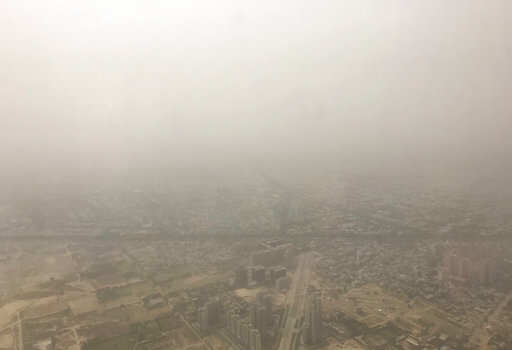 A thick cloud of dust hangs over New Delhi, India, Saturday, June 16, 2018. New Delhi officials on Thursday night, ordered a two-day halt to construction in an attempt to reduce choking pollution that has cloaked the city in smog and dust. The government's Central Pollution Control Board rated the city's air quality Friday as "severe" the worst possible category for the fourth day in a row.Photo/Yirmiyan Arthur)