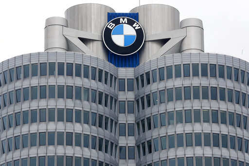 In this Wednesday, March 21, 2018 photo the logo of German car manufacturer BMW is pictured at the headquarters in Munich, Germany.Photo/Matthias Schrader, file)