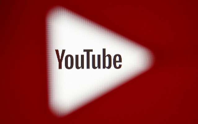 A 3D-printed YouTube icon is seen in front of a displayed YouTube logo in this illustration taken October 25, 2017. REUTERS/Dado Ruvic/Ilustration/File Photo