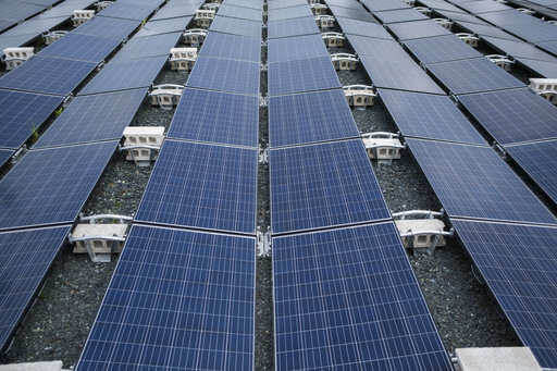 In this July 20 photo, solar panels installed by Tesla, power a community of 12 homes in the mountain town of Las Piedras, Puerto Rico. The homes still do not have power from the national grid, more than 10 months after Hurricane Maria and now is operating exclusively on solar energy.Photo/ Dennis M. Rivera Pichardo)