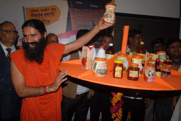 Yoga pause? Ramdev's Patanjali  is caught in 6 body locks