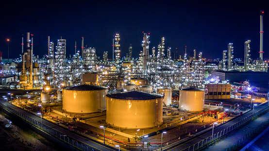UAE's ADNOC in advanced talks to sell refinery stakes: sources