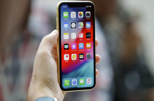 The new Apple iPhone XR is on display at the Steve Jobs Theater after an event to announce new products Wednesday, Sept. 12, 2018, in Cupertino, Calif.Photo/Marcio Jose Sanchez)