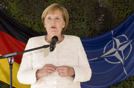 Angela Merkel in Ukraine to discuss conflict and gas