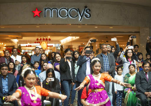 Macy's raises profit forecast before key holiday season