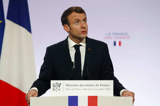 Macron updates French energy strategy, won't close more nuclear plants before 2022