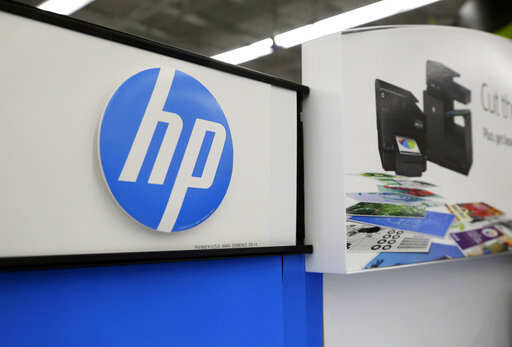FILE - In this May 24, 2016, file photo, Hewlett-Packard products are on display at a store in North Andover, Mass. HP Inc. reports financial results Thursday, Nov. 29, 2018.Photo/Elise Amendola, File)