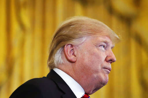 Trump targets pair of Obama-era green rules to boost oil, coal