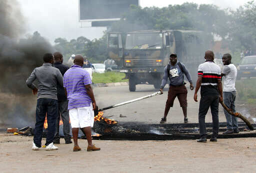 Zimbabwe military quells fuel price hike protests; 8 killed