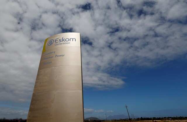 The logo of state power utility Eskom is seen outside Cape Town's Koeberg nuclear power plant. REUTERS/Mike Hutchings/File Photo