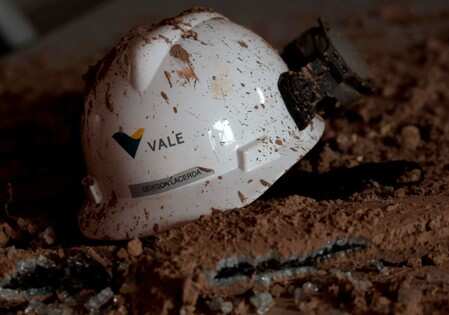 A helmet with a logo of Vale SA is seen in a collapsed tailings dam owned by the company, in Brumadinho, Brazil February 13, 2019. REUTERS