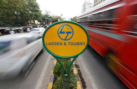 A sign of Larsen and Toubro (L&T) is placed on a road divider in Mumbai, May 25, 2016. REUTERS/Shailesh Andrade/Files