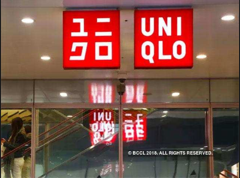 Uniqlo owner Fast Retailing cuts outlook after winter discounts