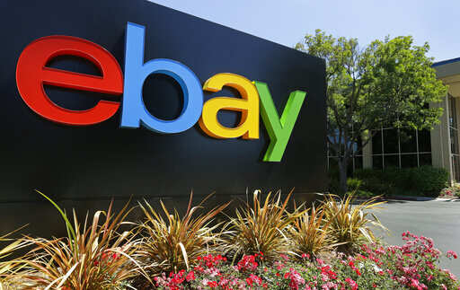 EBay raises forecast as redesign draws customers, boosts ad revenue