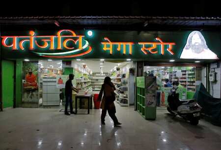 Dash for growth at Ramdev's Patanjali leads to stumbles