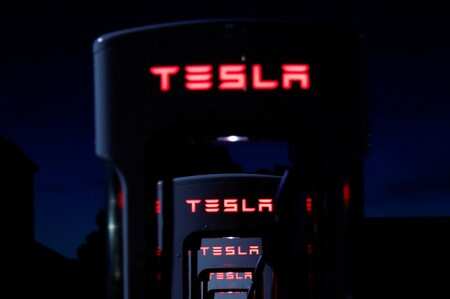 Tesla Superchargers are shown in Mojave, California, U.S., March 11, 2019. REUTERS/Mike Blake/Files