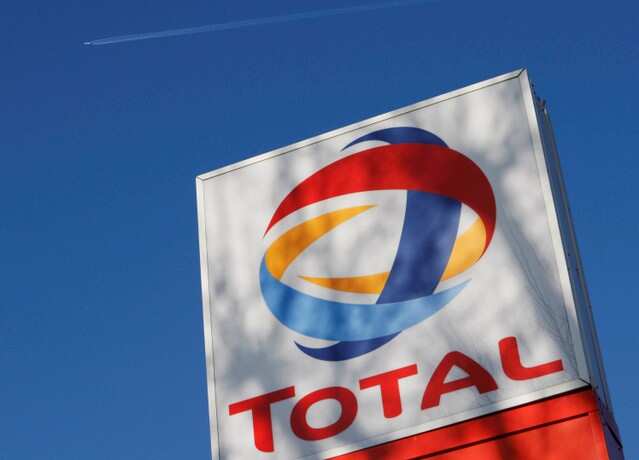 A logo for oil giant Total is seen at a petrol station in London February 12, 2008. REUTERS/Stephen Hird/File Photo