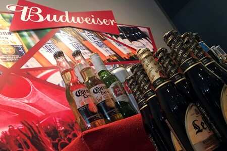 Beer giant AB InBev toasts best volume sales in five years