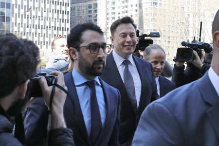 Tesla CEO Elon Musk, center. AP/PTI
