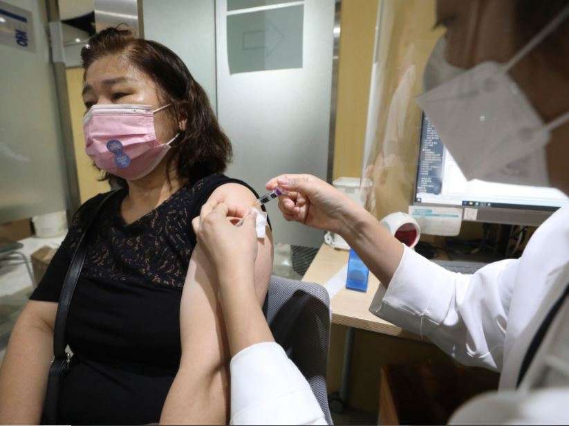 South Korea urges people to get flu shot despite deaths