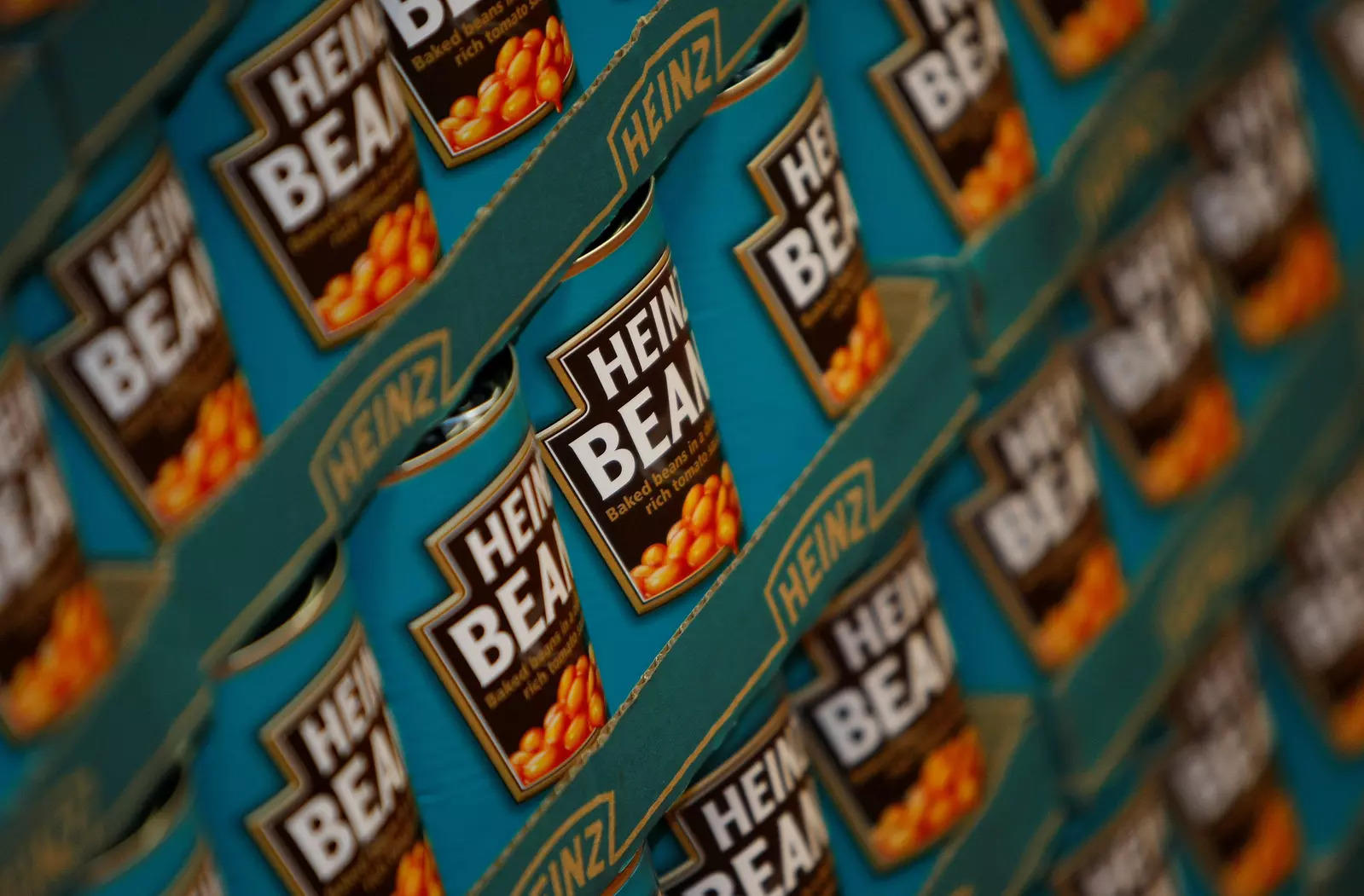 Tins of Heinz Baked Beans rest on a palette in the company's factory in Wigan, northern England, May 21, 2009. (Reuters)