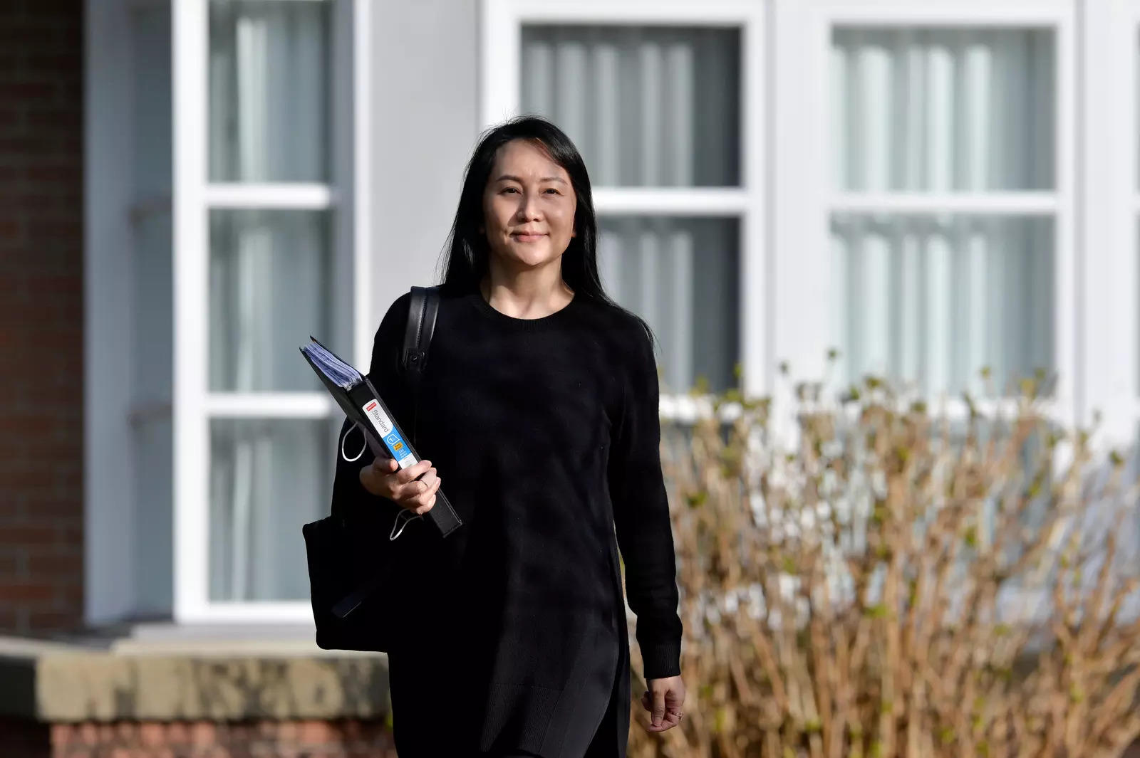 Huawei Technologies Chief Financial Officer Meng Wanzhou leaves her home to attend a court hearing in Vancouver, British Columbia, Canada March 22, 2021. 