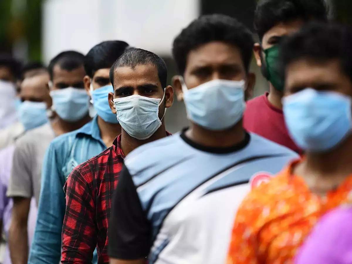 People can be seen wearing a mask as protection from the coronavirus. The second wave sweeping the country has come at a time when the economy was emerging from the impact of the lockdown imposed last year. (Representative image)