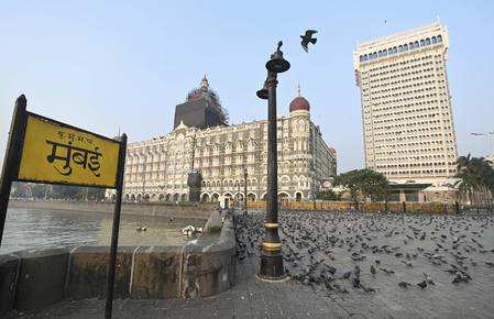 <p>Mumbai: Gateway of India and Taj Hotel on the eve of the 12th anniversary of 26/11 terror attack in Mumbai. (PTI Photo/Shashank Parade)(</p>