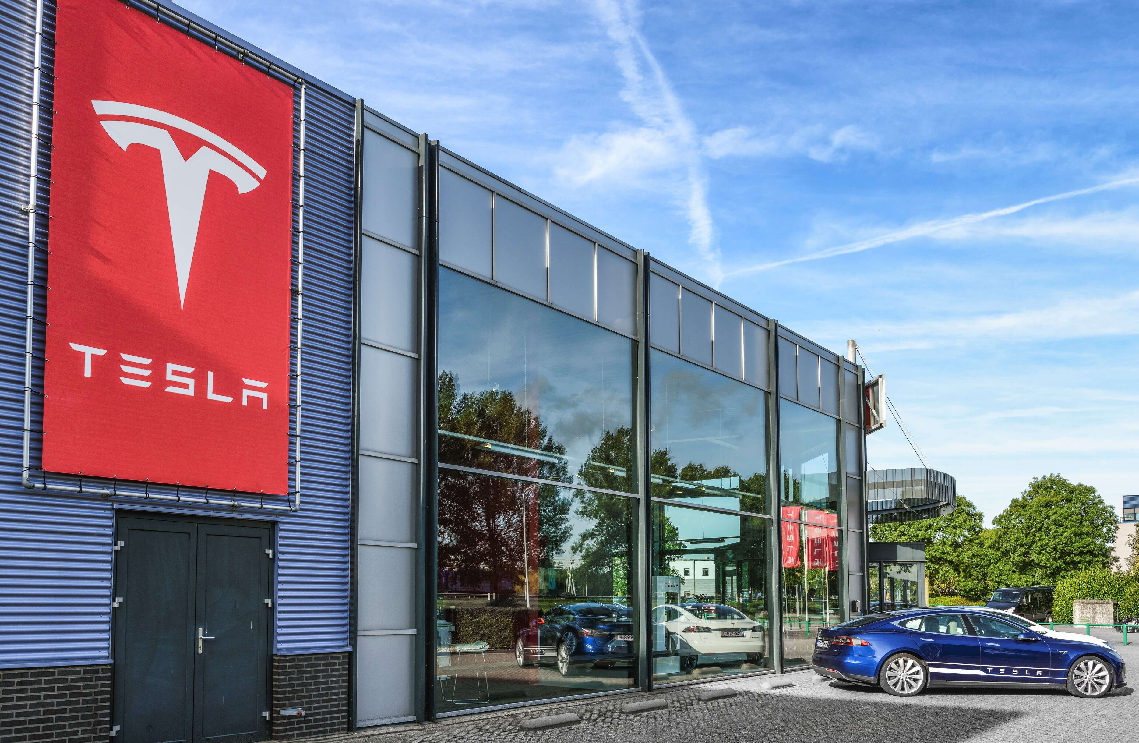 Tesla: Tesla to buy more than $1 billion of Australian battery minerals a  year, Auto News, ET Auto