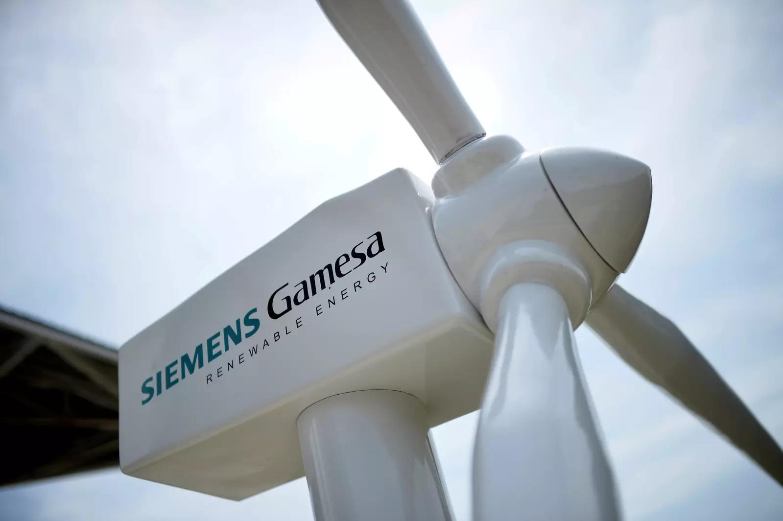A model of a wind turbine with the Siemens Gamesa logo is displayed outside the annual general shareholders meeting in Zamudio, Spain, June 20, 2017. REUTERS/Vincent West/File Photo