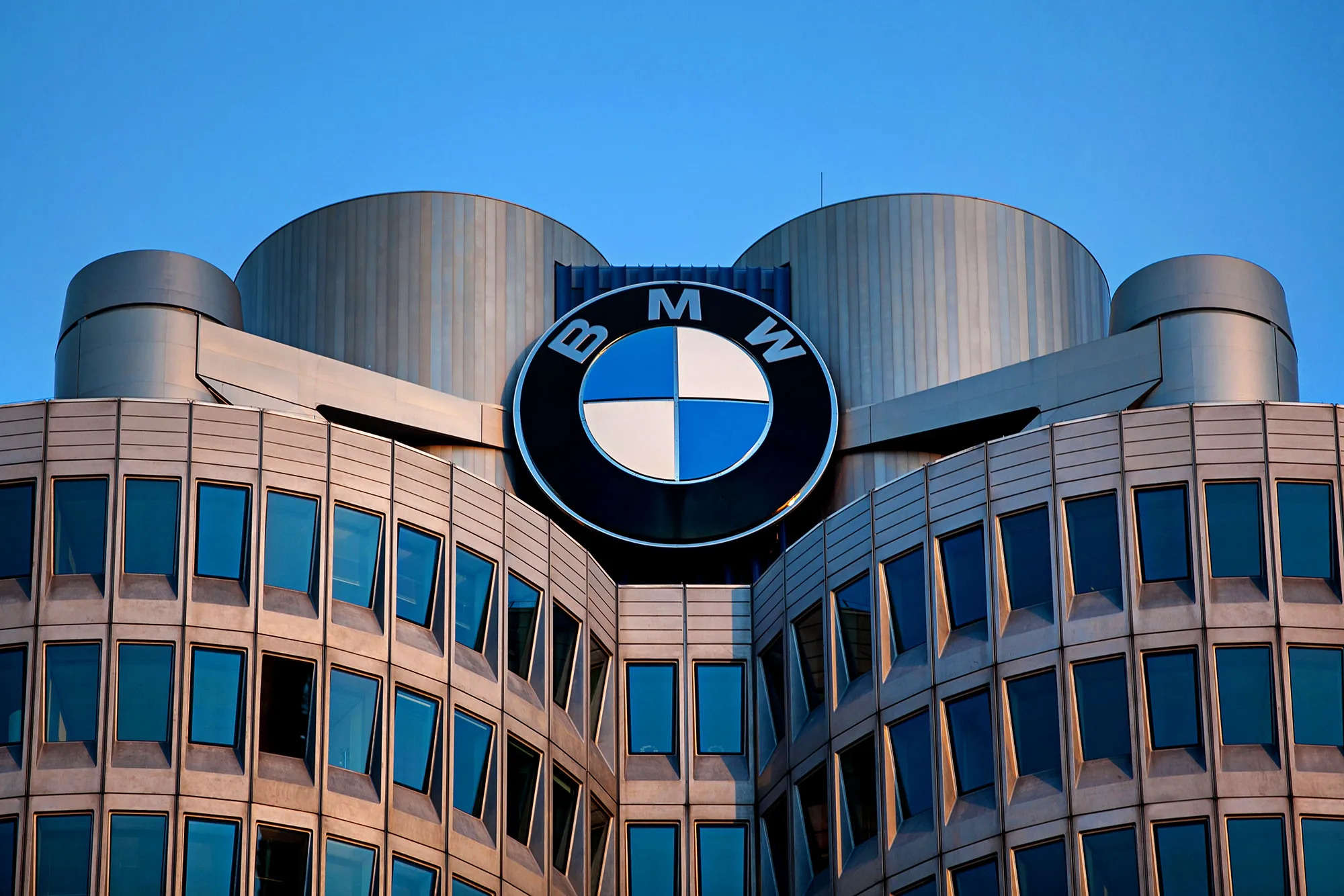 BMW to resume production at some plants
