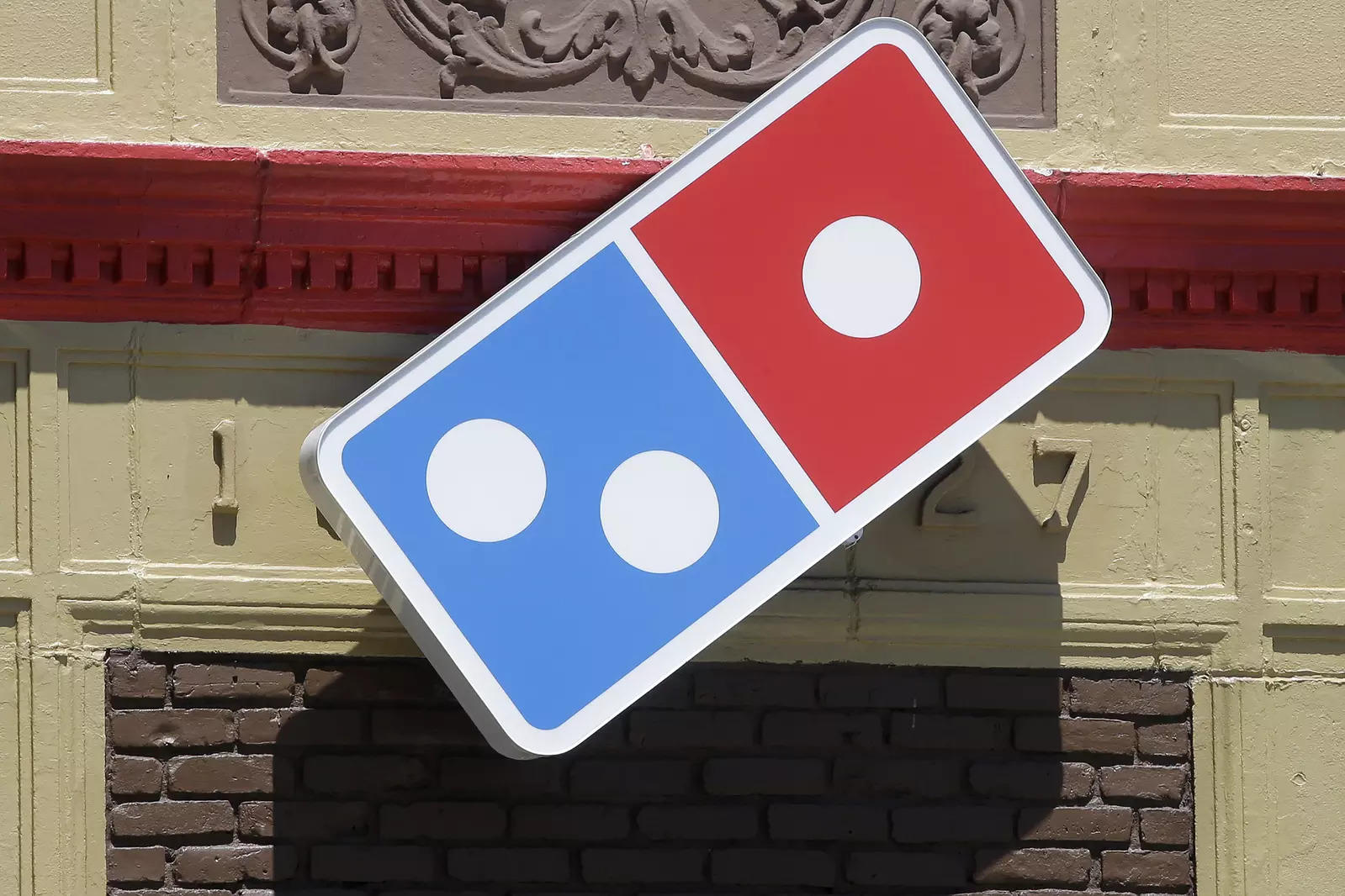 Domino's Russian arm suspends royalties but pizza outlets remain open
