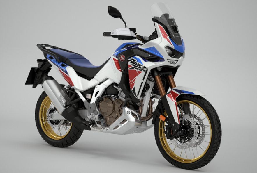   2022 Africa Twin Adventure Sports- Manual Transmission in Pearl Glare White Tricolor scheme with new exciting stripes.