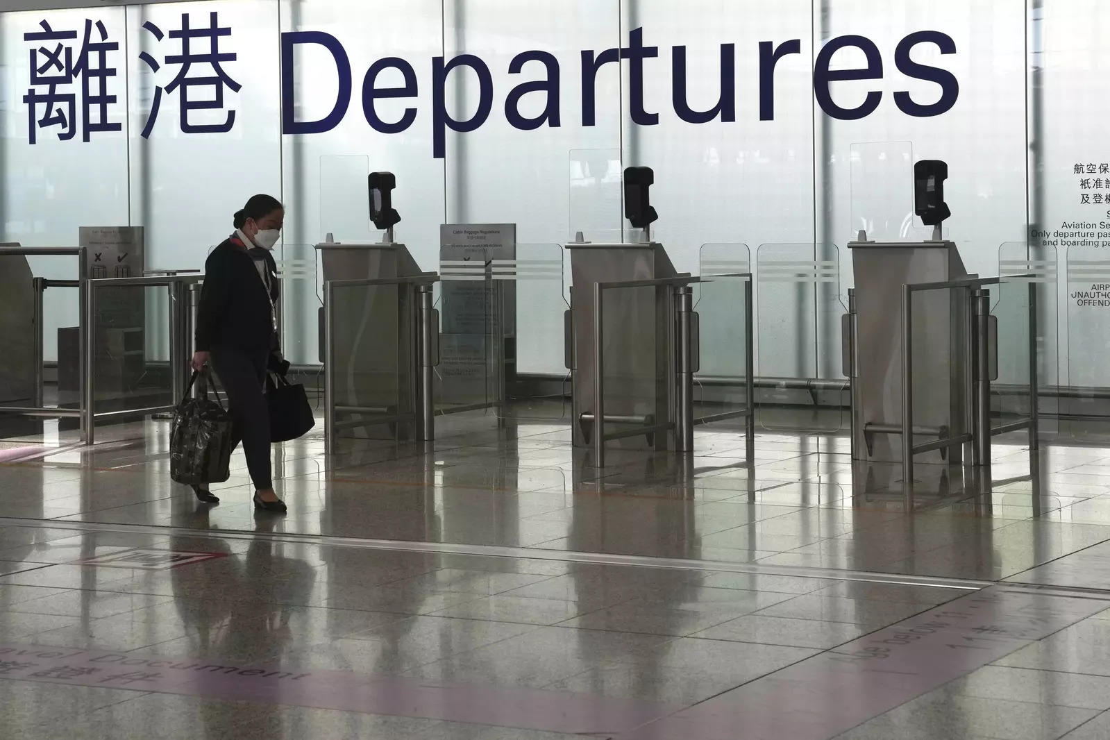 Hong Kong to lift flight bans from April 1, cut quarantine for arrivals